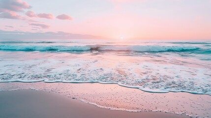 Beautiful sunset view over the ocean with gentle waves and a pink sky, perfect for capturing serene and peaceful beach moments.