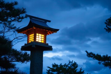 Fototapeta premium Close-up of illuminated lantern glowing at dusk - warmth - illumination - peaceful night