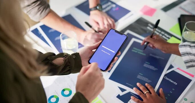 Business meeting, people and hand with phone in app for software development, proposal and idea. Top view, tech and developer with screen at digital agency for ux presentation, pitch and teamwork