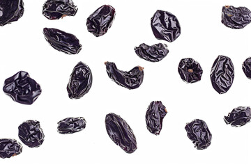 a bunch of dried raisins on a white surface