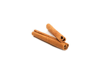 Cinnamon sticks isolated on white background. Cinnamon roll. Spicy spice for baking, desserts and drinks. Fragrant ground cinnamon.