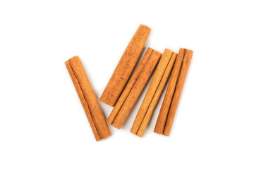 Cinnamon sticks isolated on white background. Cinnamon roll. Spicy spice for baking, desserts and drinks. Fragrant ground cinnamon.