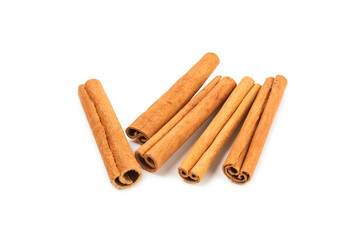 Cinnamon sticks isolated on white background. Cinnamon roll. Spicy spice for baking, desserts and drinks. Fragrant ground cinnamon.