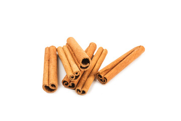 Cinnamon sticks isolated on white background. Cinnamon roll. Spicy spice for baking, desserts and drinks. Fragrant ground cinnamon.