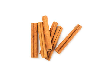 Cinnamon sticks isolated on white background. Cinnamon roll. Spicy spice for baking, desserts and drinks. Fragrant ground cinnamon.