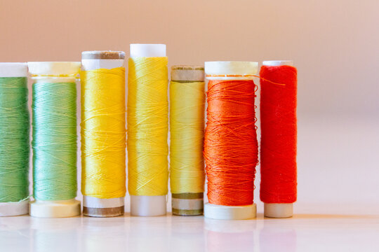 Colorful Sewing Thread Spools on Display