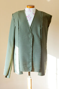 Tailor's Mannequin With Unfinished Green Garment