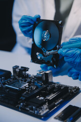 Close up of Technician measuring voltage electronic circuit board television, Service after sale fix electric equipment within insurance.