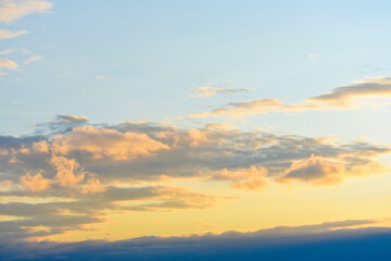 Beautiful red and blue clouds in the evening. A beautiful sunset with clouds.