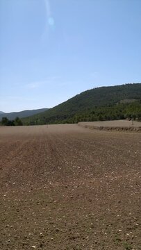 Slow motion, threshed field prepared for cultivation