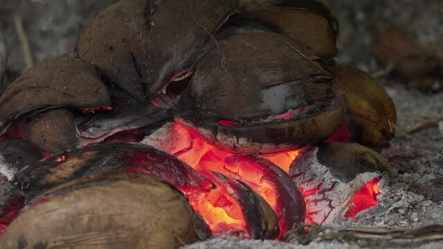 smoke drying copra using coconut shells as natural fuel source