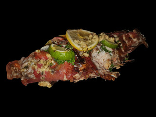 Grilled red sea bass.Grilled fish with lemon slices