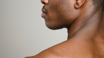  A close-up of a man's bare back