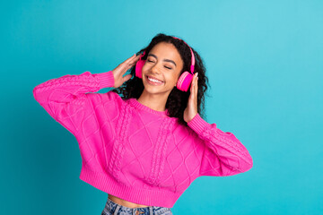 Photo portrait of attractive teen girl headphones enjoy music dressed stylish pink clothes isolated...