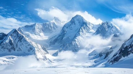 Obraz premium Snowy Mountains Towering under Blue Sky