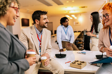 Group of multiracial business people having coffee break from a business meeting.