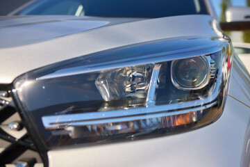 Close up of a cars headlight, part of automotive design