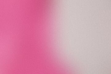 Abstract grainy texture with a soft pink to white gradient, ideal for backgrounds