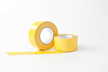 Yellow Adhesive Tape Roll on a White Background