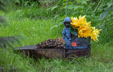 mushrooms on a stump and garden decorations