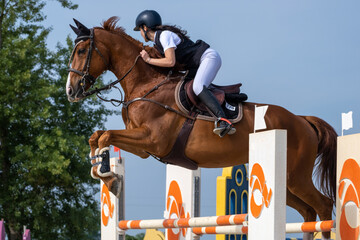 Show jumping competition on horseback. Horse Jumping, Equestrian Sports, Show Jumping themed photo.
