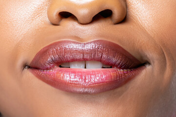 Obraz premium lips of a woman giving a kiss, perfect lips, glamour makeup, closeup on lipstick