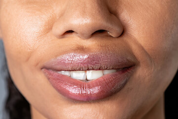 Fototapeta premium close up lips of woman, pink lipstick, beautiful smile, woman with perfect teeth