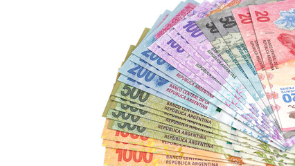 Argentine Peso currency banknotes in various denominations.