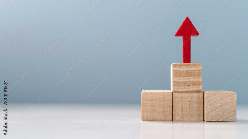 Poster wooden blocks on a gradient background, topped with a red arrow symbolizing upward growth