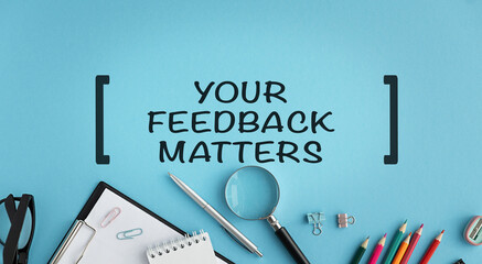 Hand writing inscription Your Feedback Matters with marker and office items, Business concept