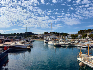 view over the port with yachts towards the beautiful bay of Llafranc, Camí de Ronda, Costa Brava, Girona, Catalonia, Spain