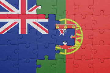 puzzle with the colourful national flag of portugal and flag of new zealand.