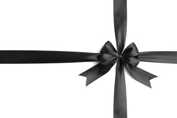 Black satin ribbon with bow isolated on white, top view