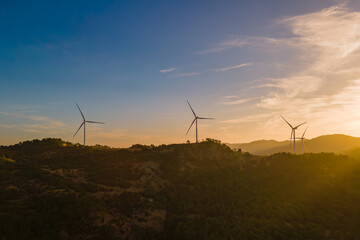 Renewable wind power farm Energy transition concept, Aerial view of electricity generator wind turbines with carbon neutral