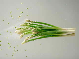 Fresh sliced asparagus plant on white background. Top view. Vegan healthy food.