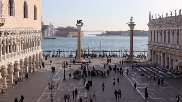 Piazzetta at St Mark's Square. Boats in the venetian lagoon in the background