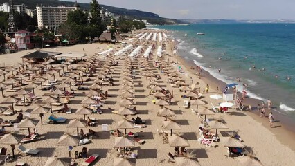 Aerial view of the beach and hotels in Golden Sands, Zlatni Piasaci. Popular summer resort near Varna, Bulgaria. Drone view from above. Summer holidays destination
