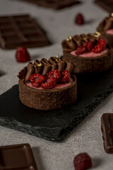 Sweet homemade chocolate cake with red berries