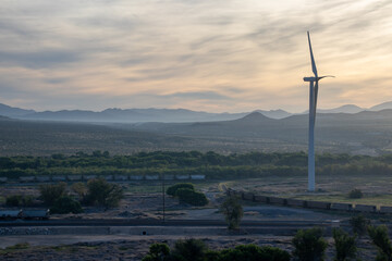 wind turbine and trains in Oro Grande high desert  © JayByrd