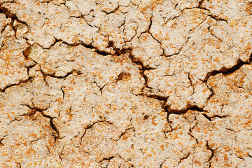 Cracked wall with rust and dirt