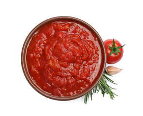 Homemade tomato sauce in bowl and fresh ingredients isolated on white, top view