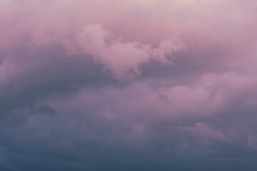 Rain clouds in the setting sun