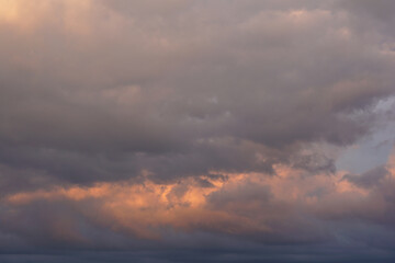 Rain clouds in the setting sun
