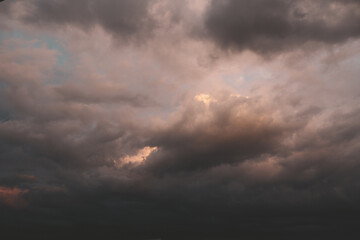 Rain clouds in the setting sun