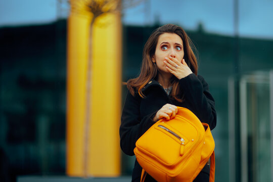 Stressed Woman Losing her Belongings Feeling Anxious. Unhappy lady realizing she got mugged in a big city
