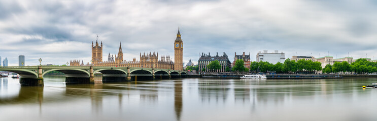 Big Ben and Westminster parliament with reflections in river Thames. London. Great Britain
