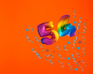 Confetti explosion with number 54 balloon - Celebration on orange background. Birthday card