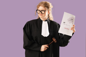 Female judge with gavel and menstrual calendar on violet background