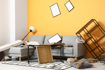 Interior of light living room after strong earthquake