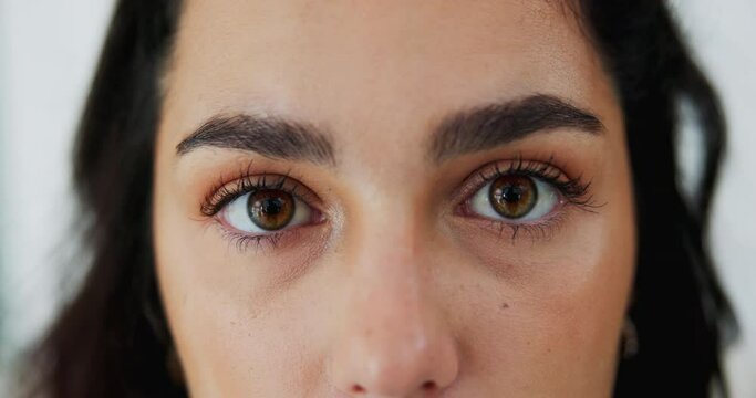 Woman, eyes and face in closeup for skincare, eyesight and optical care isolated in studio. Female person, eyebrows and beauty with vision for eyelash extension, facial treatment and microblading